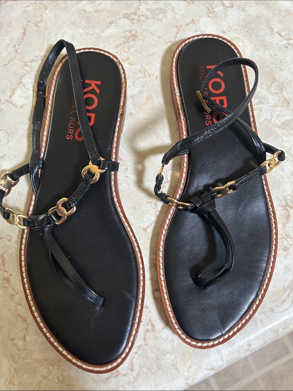 MICHAEL Michael Kors Black Leather Thong Sandals with Gold Chain Detail